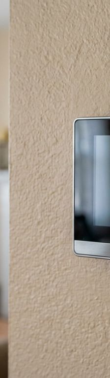 A blank, dark thermostat screen on a wall, indicating the air conditioner is not turning on.