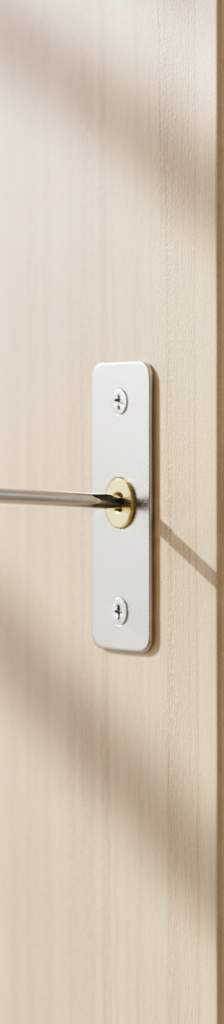 Homeowner adjusting a door strike plate with a screwdriver to fix a latching problem.