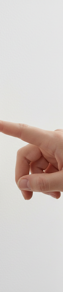 Homeowner's hand cautiously touching a discolored, warm light switch indicating an electrical problem