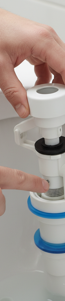 Homeowner inspecting the fill valve inside a toilet tank to fix slow filling